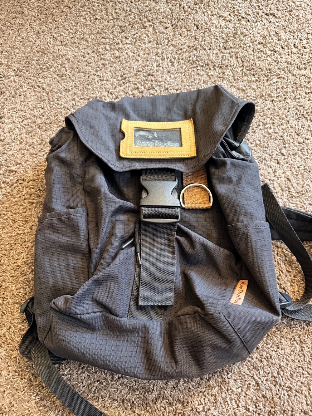 Acne gray backpack with tan patch